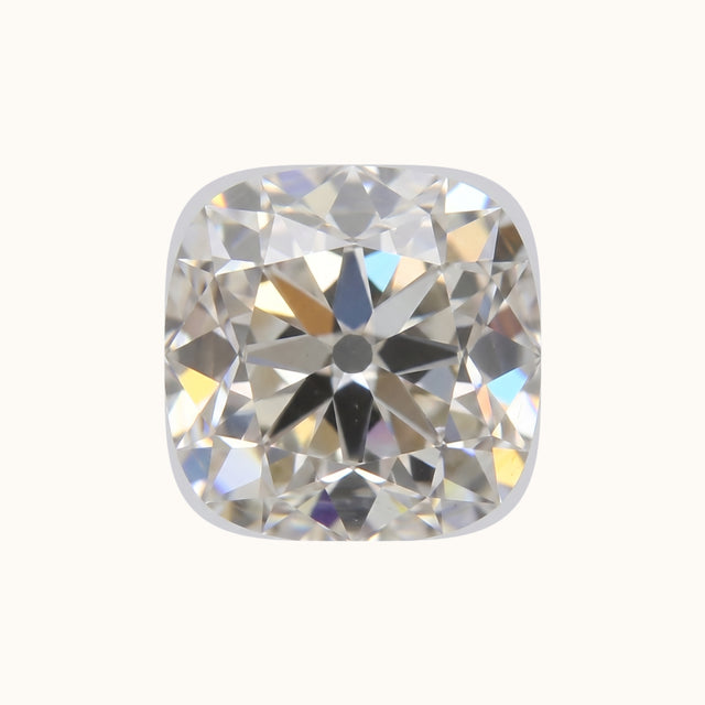 Old mine cut diamond face-up reference showing its cushion-like outline and visible facet pattern | Sula Bridal